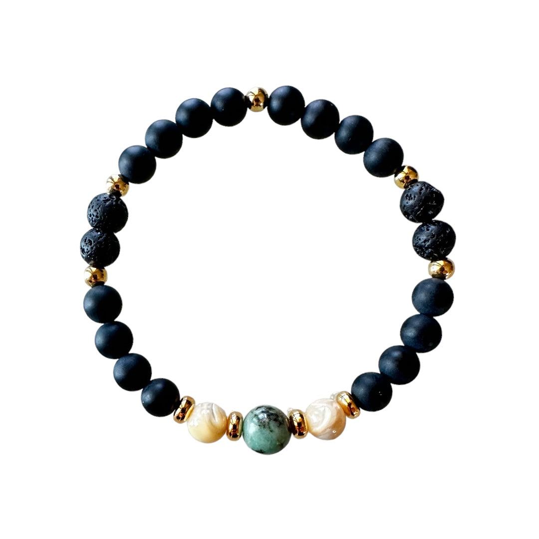 Bracciale elastico unisex con perle di Onice nera e Smeraldo grezzo