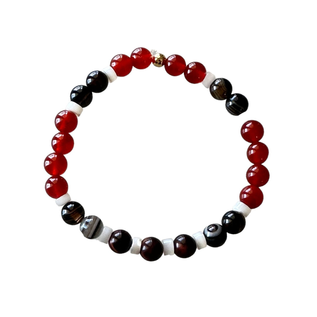 Bracciale elastico unisex con perle di agata rossa.