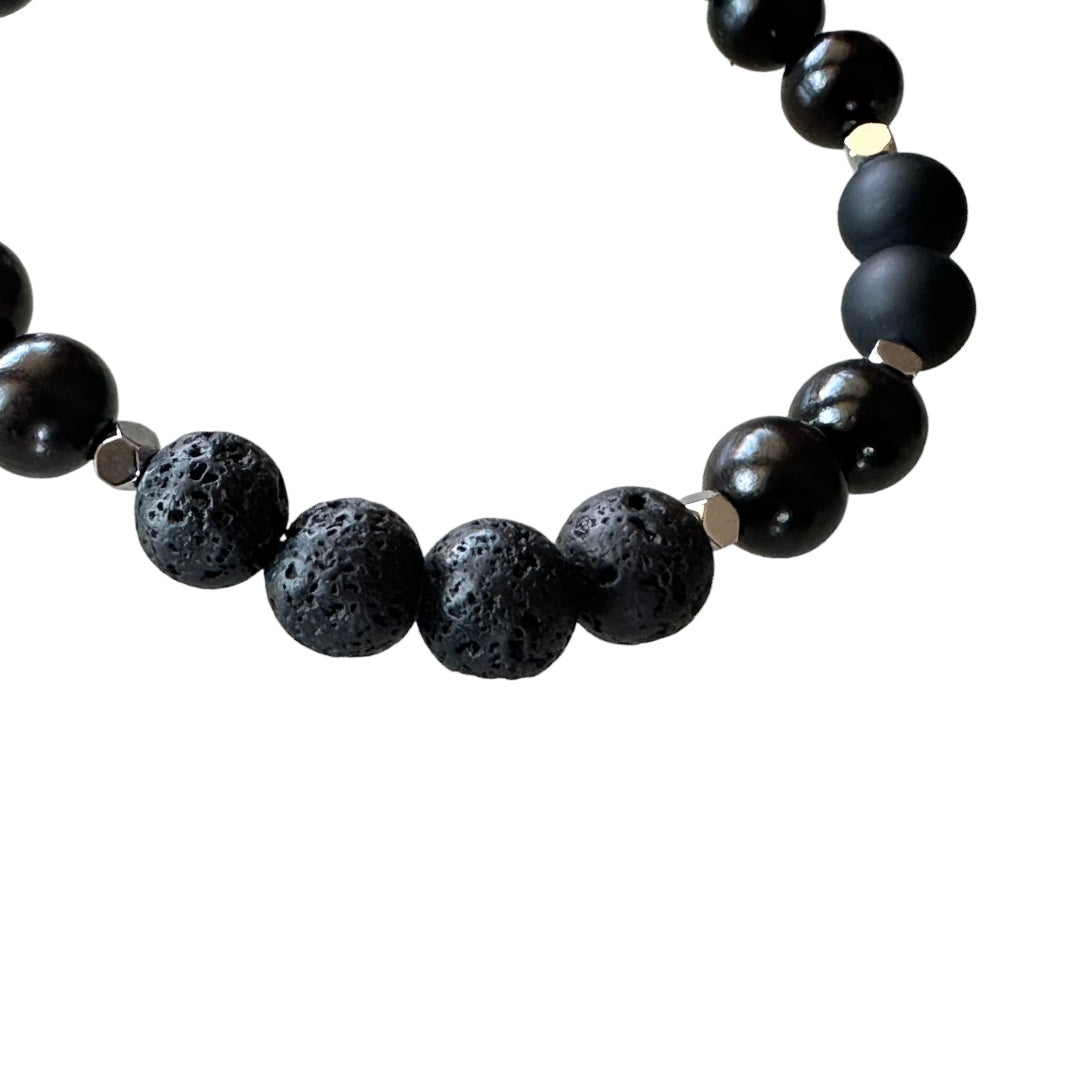Bracciale elastico unisex con perle di onice nera, legno e pietra lavica