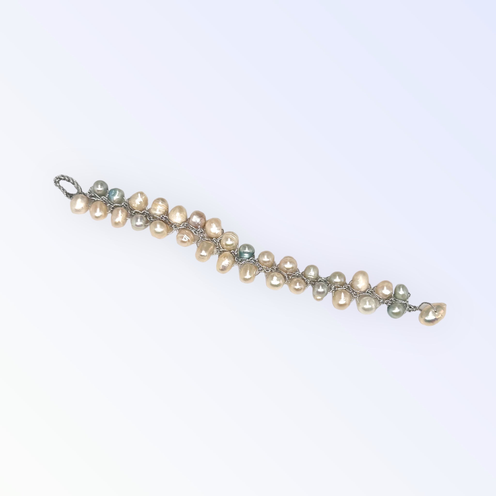 Bracciale con perle e filo gioiello a intreccio da donna